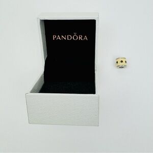 Pandora Retired Sterling Silver Charm. Cream enamel, black cubic zirconia stones